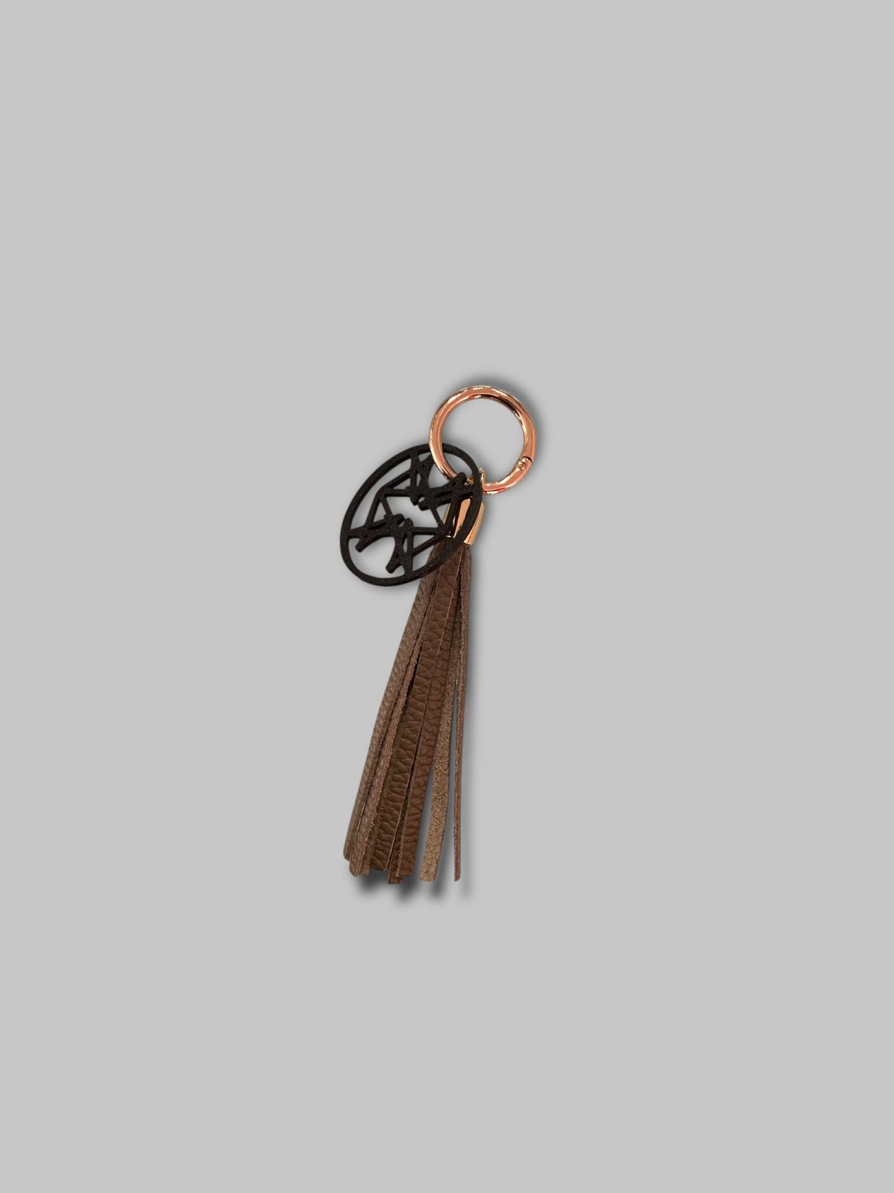 MONOGRAM LEATHER BAG CHARM TAUPE